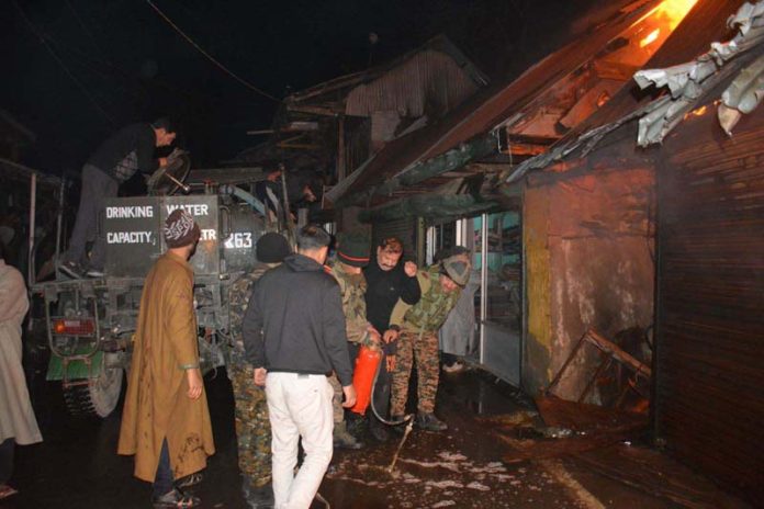 Army personnel containing fire. Army personnel containing fire.