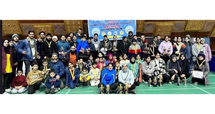 Dignitaries posing with Badminton players at SKISC Srinagar.