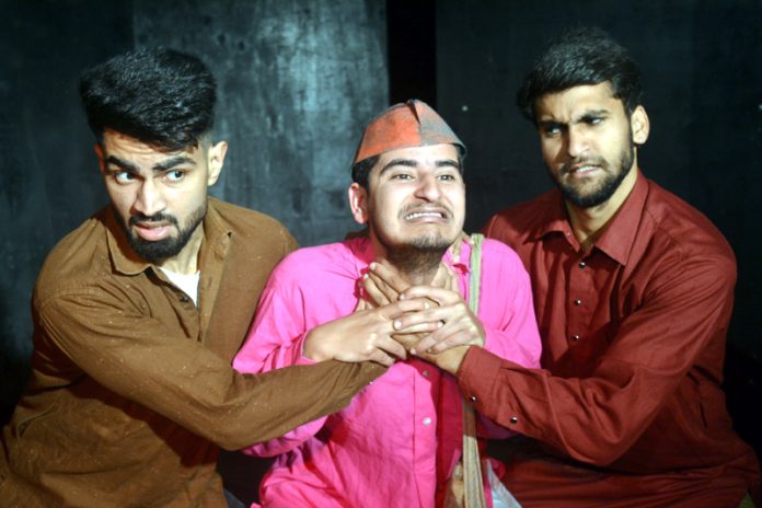 A scene from the play ‘Topian’ staged at Jammu on Sunday.