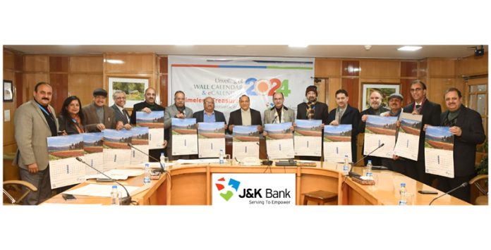 MD & CEO Baldev Prakash and others unveiling J&K Bank Wall Calendar - 2024 on Friday. MD & CEO Baldev Prakash and others unveiling J&K Bank Wall Calendar - 2024 on Friday.