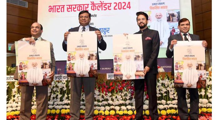 Union Minister for Information and Broadcasting, Youth Affairs and Sports, Anurag Singh Thakur launches Government of India Calendar for 2024 during release ceremony at National Media Centre, in New Delhi on Saturday. (UNI)