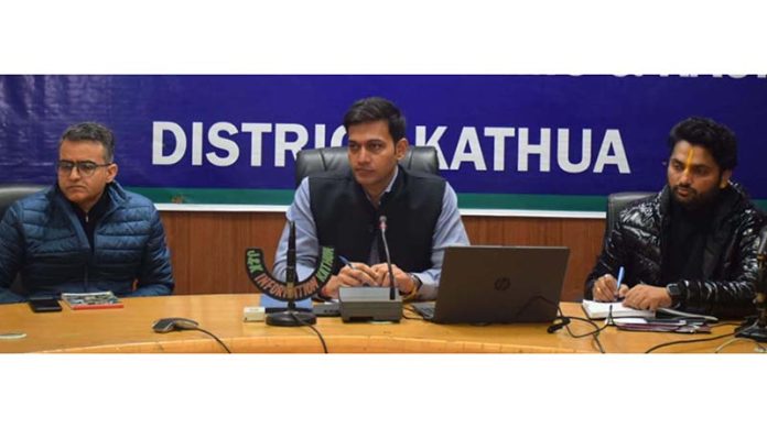 DC Kathua chairing a meeting at Kathua on Friday.