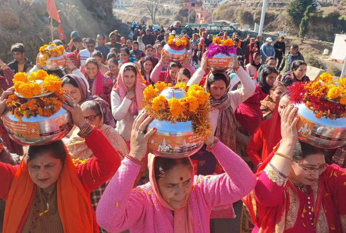 Women carry special pots over their heads during ‘Akshat Kalash Yatra’ in Bhaderwah. -Excelsior/Tilak Raj Women carry special pots over their heads during ‘Akshat Kalash Yatra’ in Bhaderwah. -Excelsior/Tilak Raj