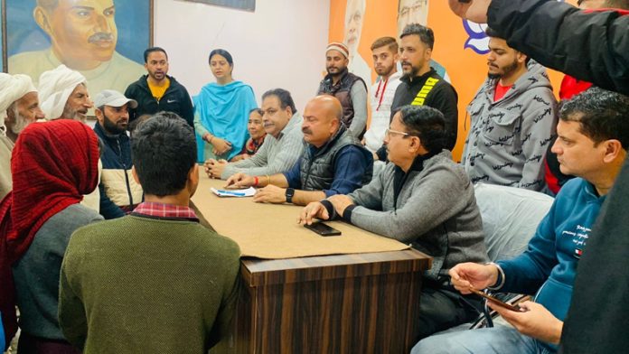 BJP vice president, Yudhvir Sethi listening public grievances at Jammu on Thursday.