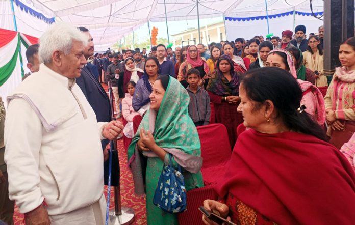 LG Manoj Sinha interacting with a participant during Viksit Bharat Sankalp Yatra at Nagrota on Friday. LG Manoj Sinha interacting with a participant during Viksit Bharat Sankalp Yatra at Nagrota on Friday.