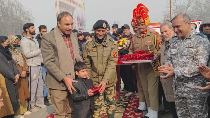 IG BSF Ashok Yadav with the villagers at Malangpora, Pulwama on Saturday. -Excelsior/Younis Khaliq