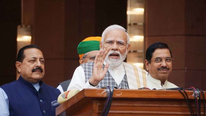 Prime Minister Narendra Modi talking to newsmen on arrival at Parliament House on the first day of winter session in New Delhi on Monday. (UNI) Prime Minister Narendra Modi talking to newsmen on arrival at Parliament House on the first day of winter session in New Delhi on Monday. (UNI)