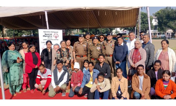 Contingent of specially-abled athletes posing with IGP Jammu Anand Jain before leaving for Special Olympics Athletes on Sunday.