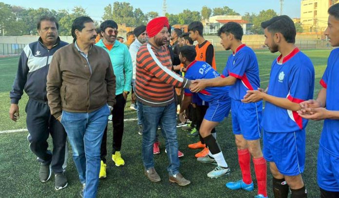 Chief Guest interacting with players during football match at Parade Ground, Jammu.