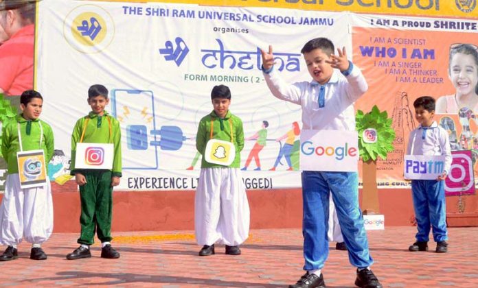 Students creatively reflecting usage of popular social media platforms during a programme in school.