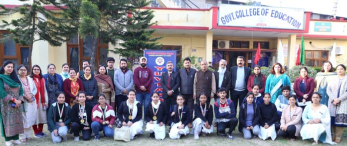Winners of various events posing with organizers of Yuvtarang.