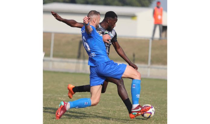 Football players in action during match between Real Kashmir FC and Delhi FC on Sunday. Football players in action during match between Real Kashmir FC and Delhi FC on Sunday.