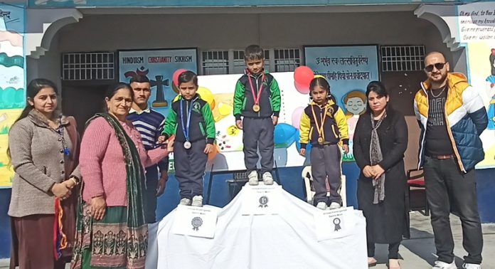 Kindergarten students of Nav Adarsh Higher Secondary School Kathua posing with medals during Annual Sports Meet.