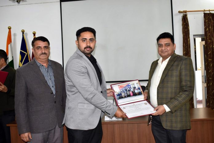 SSP Rajinder Kumar Gupta, Deputy Director, SKPA, providing a certificate to a trainee on Saturday.