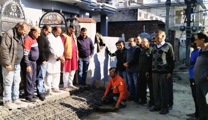 Former corporator and senior BJP leader, Sanjay Kumar Baru inspecting laying of tile work in Ward 41, Jammu on Tuesday. Former corporator and senior BJP leader, Sanjay Kumar Baru inspecting laying of tile work in Ward 41, Jammu on Tuesday.