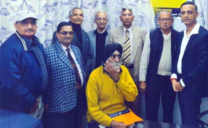 Dignitaries posing for a group photograph during a medical camp at SVMM Charitable Hospital Ambphalla, Jammu.