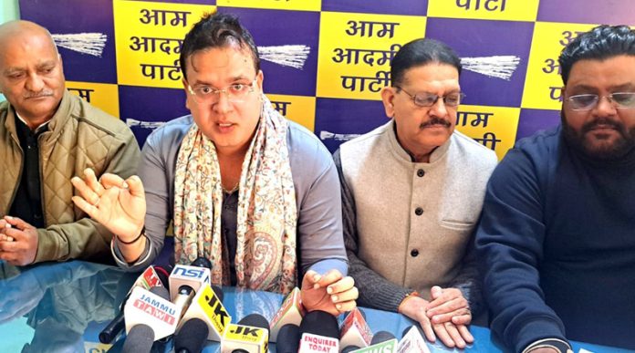 Senior AAP leader Jayesh Gupta addressing a press conference at Jammu on Thursday.