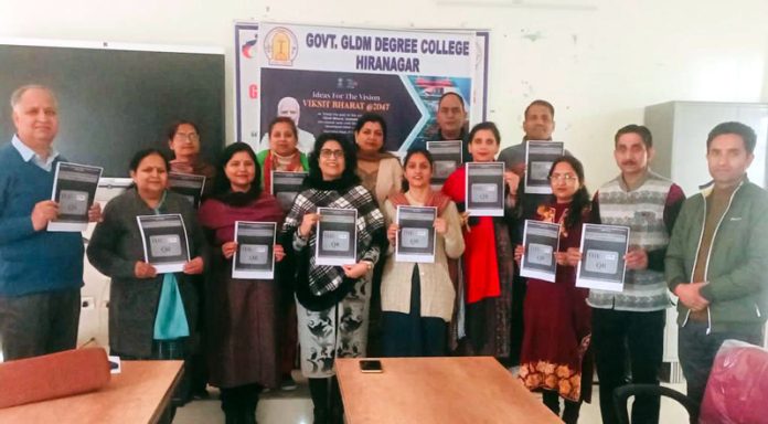 Principal of GDC Hiranagar releasing the college newsletter on Wednesday.