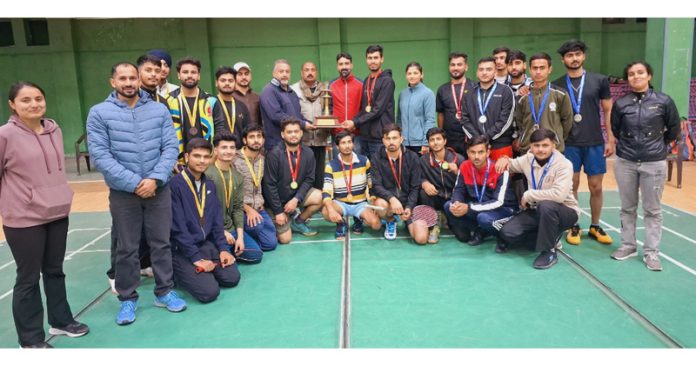 PG Department team of Jammu University posing with trophy.