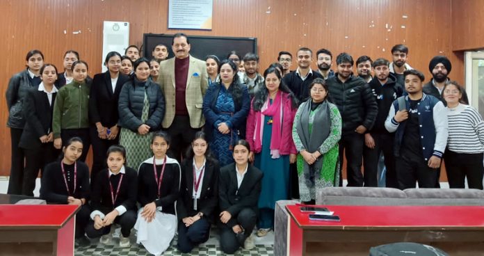 Students and staff of Govt SPMR Commerce College during a symposium.