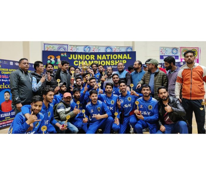 J&K Boys junior team posing with trophy. J&K Boys junior team posing with trophy.