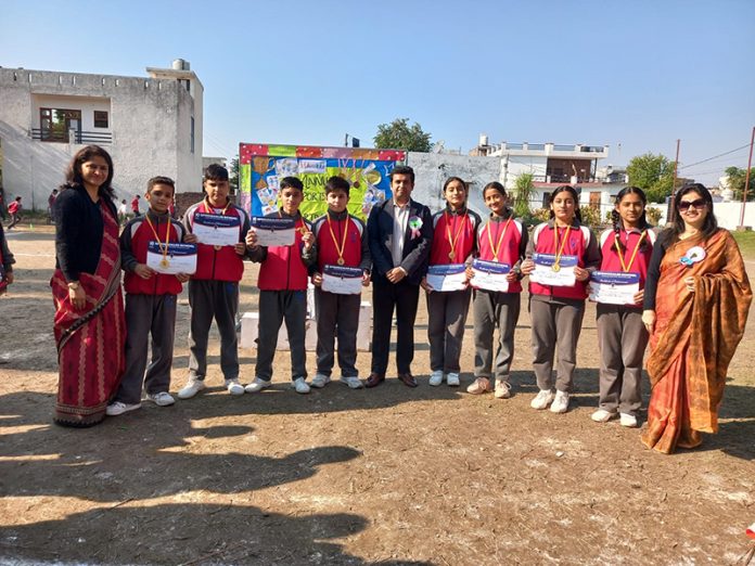Students displaying certificates during Annual Sports Day. Students displaying certificates during Annual Sports Day.
