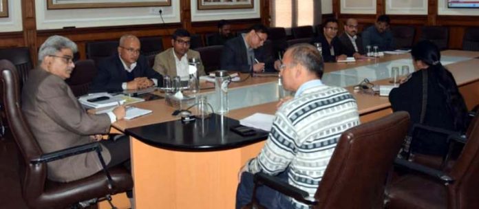 Chief Secretary Atal Dulloo chairing a meeting on Tuesday.