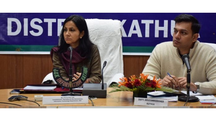 Commissioner Secretary Information and IT chairing a meeting at Kathua.