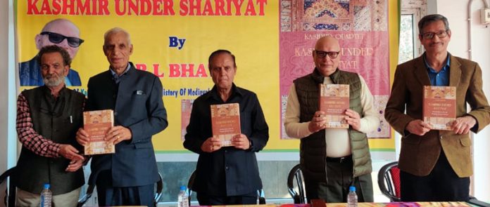 Dignitaries releasing Dr R L Bhat's book at Jammu on Sunday.