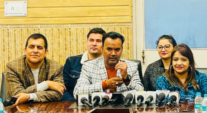 Director Tourism Vivekananda Rai along with his subordinates interacting with tourism stakeholders at Katra in Reasi district.