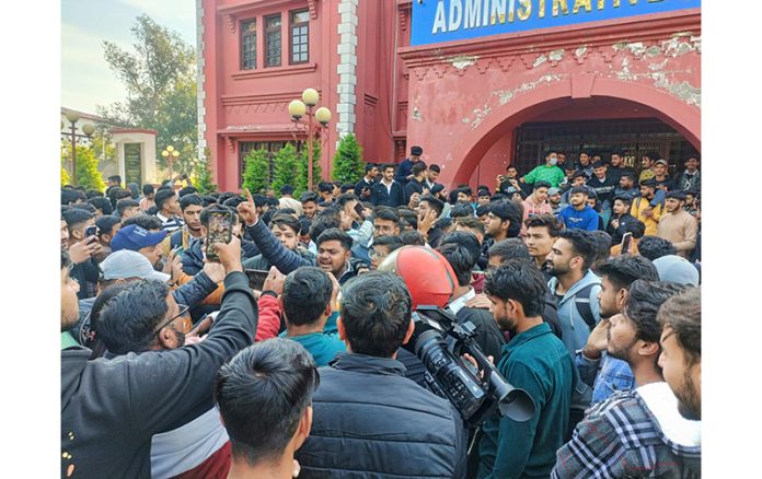 Students of Cluster University Jammu protesting for postponement of exams.
