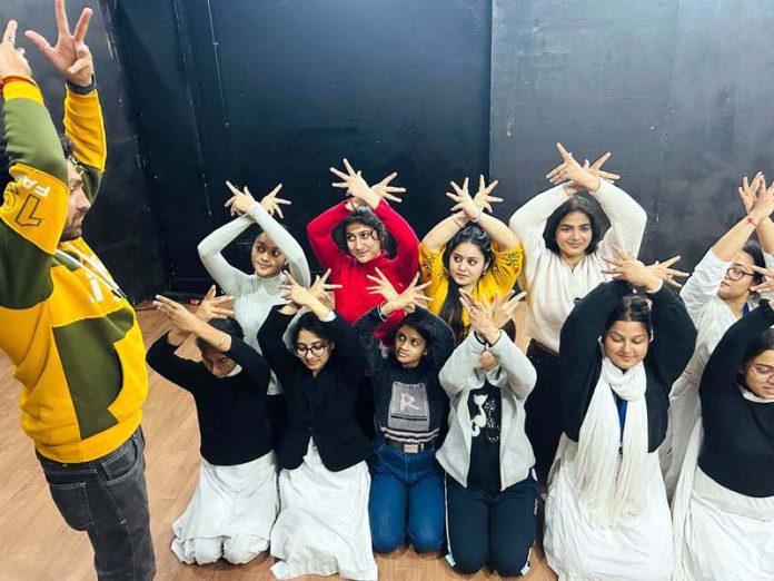 Participants dancing during a workshop on folk dances in Jammu on Friday.