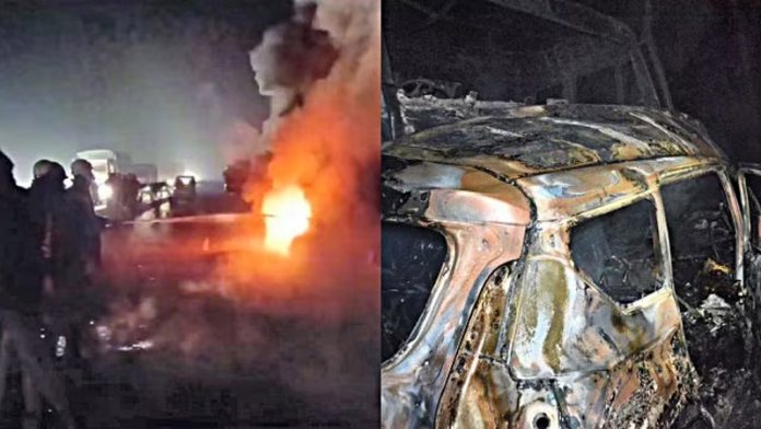 Firefighters and police personnel at the spot after an SUV caught fire following a collision with a truck on the Bareilly-Nainital road, in Bareilly district. Firefighters and police personnel at the spot after an SUV caught fire following a collision with a truck on the Bareilly-Nainital road, in Bareilly district.