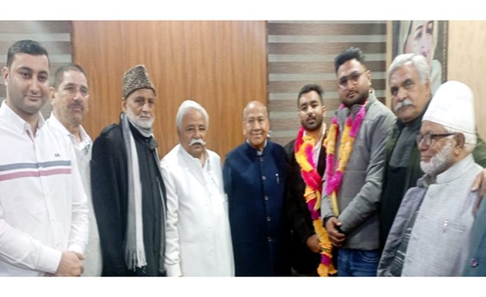 Ajay Sadhotra and Rattan Lal Gupta with NC leaders and new entrants.