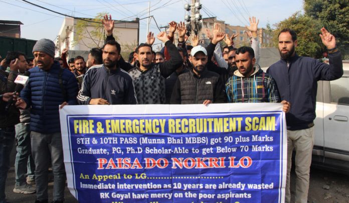 Job aspirants of F&ES Department raise slogans during a protest demonstration in Jammu on Friday.