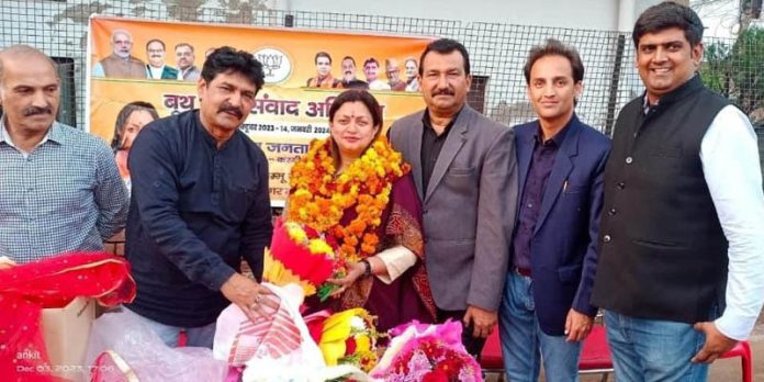 BJP Jammu district, South president, Rekha Mahajan during the Booth Jan Samvaad Abhiyan with party leaders at Narwal Pain on Monday.