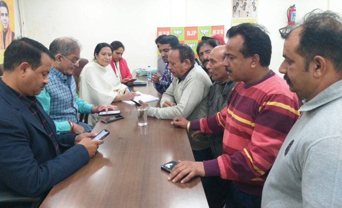 Former Deputy Chief Minister and senior BJP leader Kavinder Gupta listening public grievances in Jammu on Tuesday. Former Deputy Chief Minister and senior BJP leader Kavinder Gupta listening public grievances in Jammu on Tuesday.