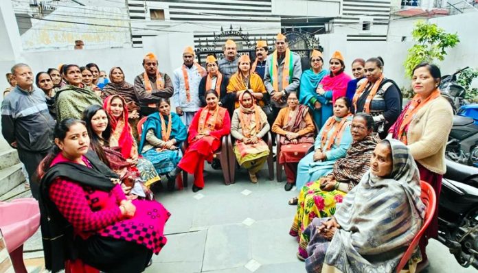 BJP leaders Rekha Mahajan and Vinay Gupta during a party meeting at Jammu on Thursday.