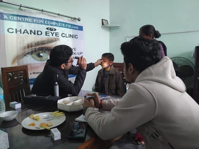 A doctor examines a person at Sant Nirankari Bhawan at Pandorian. A doctor examines a person at Sant Nirankari Bhawan at Pandorian.