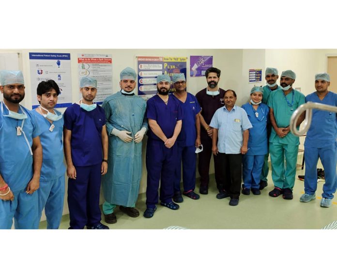 Dr Nikhil Mahajan and his team posing together after performing a rare heart revival surgery at Narayana Hospital, Kakryal in Katra. Dr Nikhil Mahajan and his team posing together after performing a rare heart revival surgery at Narayana Hospital, Kakryal in Katra.