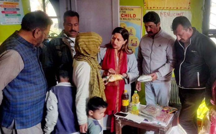 BJP District President Jammu South Rekha Mahajan interacting with Anganwadi workers on Monday. BJP District President Jammu South Rekha Mahajan interacting with Anganwadi workers on Monday.