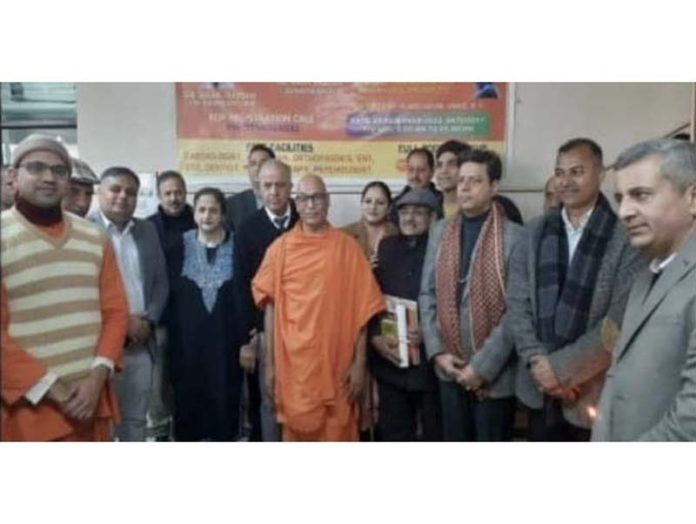 Swami Yajnadharananda (secretary, Ramakrishna Mission Jammu) along with guests during a medical camp. Swami Yajnadharananda (secretary, Ramakrishna Mission Jammu) along with guests during a medical camp.