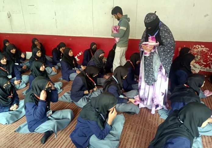 Members of LFO-BHF distributing sanitary napkins among girls of a Government school in Pulwama district. Members of LFO-BHF distributing sanitary napkins among girls of a Government school in Pulwama district.