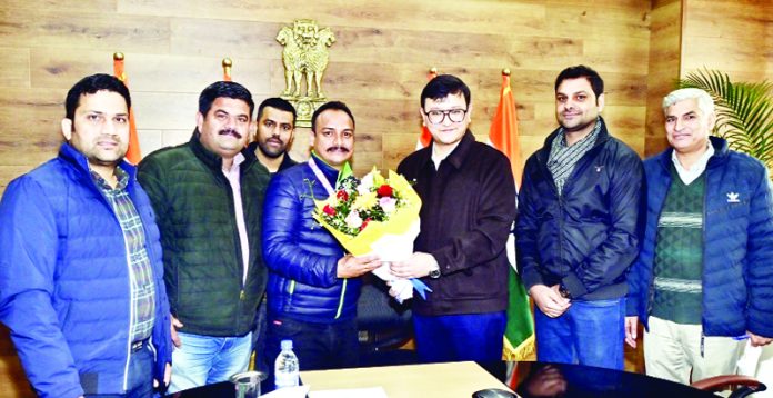Director Information, Minga Sherpa felicitating Gagan Singh Jamwal, department’s employee, for clinching Gold medal in Roller Skating. 