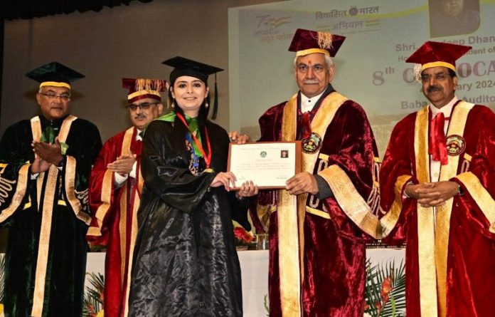 LG Manoj Sinha awarding Gold Medal certificate to a meritorious student during 8th Convocation of SKUAST-J on Thursday. LG Manoj Sinha awarding Gold Medal certificate to a meritorious student during 8th Convocation of SKUAST-J on Thursday.