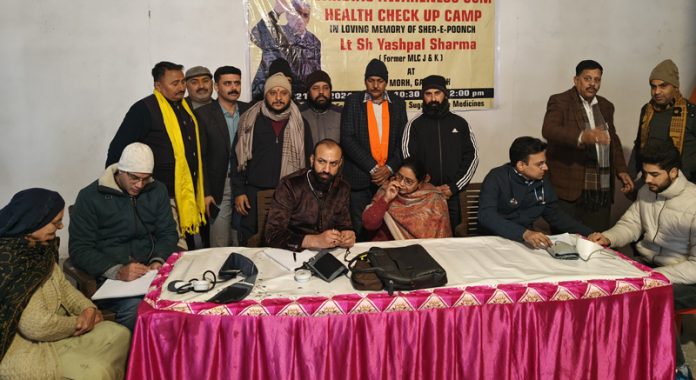 HoD Cardiology GMC & SSH Jammu Dr Sushil Sharma examining patients at Gadi Garh on Sunday.