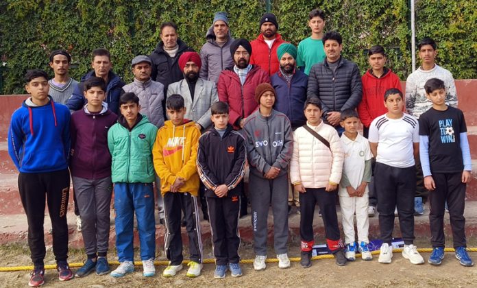 J&K Tennis Ball Cricket Team posing with dignitaries before leaving for National Championship. J&K Tennis Ball Cricket Team posing with dignitaries before leaving for National Championship.