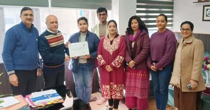 Kavinder Gupta with members of NGO Gracious Givers in Jammu on Wednesday.