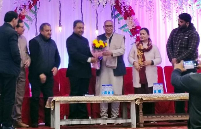 Former Mayor Jammu, Rajinder Sharma being welcomed by traders at a function at Roop Nagar on Saturday.
