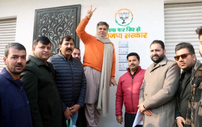 BJP JK UT, president, Ravinder Raina during party's wall writing campaign at Jammu on Monday. BJP JK UT, president, Ravinder Raina during party's wall writing campaign at Jammu on Monday.